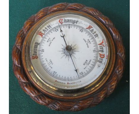 CARVED WOODEN CASED CIRCULAR BAROMETER 