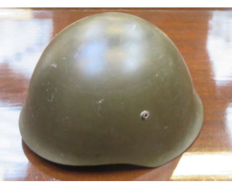 ITALIAN COMBAT HELMET, POSSIBLY WORLD WAR TWO.