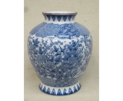 20th CENTURY ORIENTAL BLUE AND WHITE FLORAL CERAMIC VASE, STAMPED WITH CHARACTER MARKS TO BASE, APPROXIMATELY 24cm HIGH, PLUS