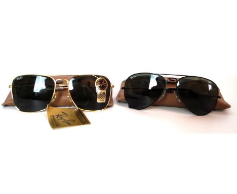 Two pairs of vintage Ray-Ban Bausch & Lomb sunglassesTo include a pair of gold framed Caravan sunglasses, 13cm wide, together