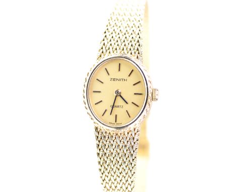 Zenith: A Ladies 14ct gold quartz bracelet wristwatchThe oval gold tone dial, with applied baton hour markers, with black han