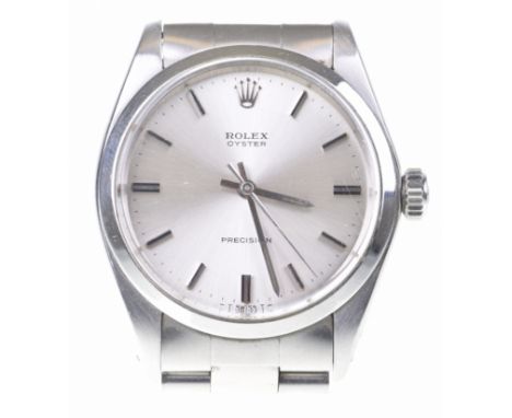 Rolex: A stainless steel Oyster Precision bracelet wristwatchThe circular silvered dial, with applied silver and black baton 