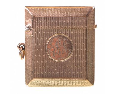 A 9ct gold Vesta caseOf rectangular form with bevelled edges, and engine turned decoration throughout, monogrammed, hallmarke