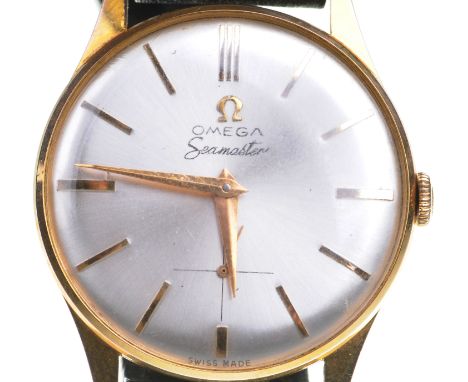 Omega: A manual wind Seamaster wristwatch The silvered circular dial with hourly applied gold tone markers, with subsidiary d