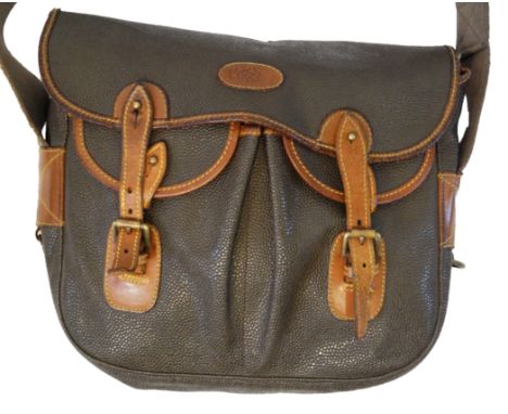 Mulberry: A vintage green Scotch grain and tan leather satchel bag Designed with an olive green Scotch grain leather exterior