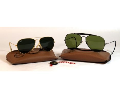 Two pairs of vintage Ray-Ban Bausch & Lomb sunglassesTo include a pair of Outdoorsman driving black aviators, 13cm wide, and 