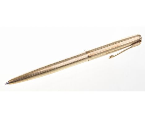Parker: A 9ct gold penWith ridged shaft and engine turned decoration, vacant cartouche, signed Parker, hallmarks for London 1