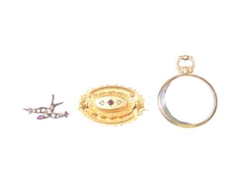 A Victorian diamond set swallow broochThe rose-cut diamonds set in white metal with a single oval shaped ruby eye, length 2.3