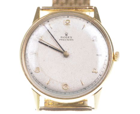 Rolex: An 18ct gold cased Precision manual wind wristwatch, circa 1950sThe circular dial, with applied gold tone Arabic numer