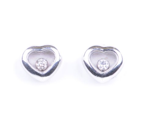 Chopard: A pair of 'Happy Diamonds' ear studsEach of heart-shaped outline, the free-moving brilliant-cut diamond collet, with