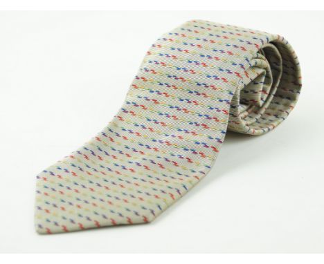An Hermes silk tieOf typical form, with woven multicoloured linear design against a ribbed neutral and black ground, length 1