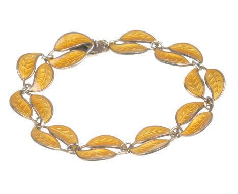 David Anderson: A silver gilt and enamel braceletEach link designed as a leaf with golden yellow enamel decoration, stamped D