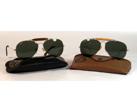 Two pairs of Vintage Ray-Ban Bausch & Lomb sunglassesTo include a pair of gold frames aviator leathers 13.5cm wide, together 