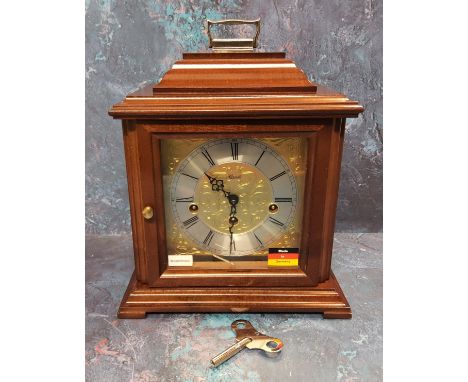 A 20thC mahogany cased bracket clock, the brass dial bearing Roman numerals, silvered chapter ring, eight day Franz Hermle mo