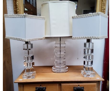 A pair of 20th century century Perspex stacked cube design lamp bases, cream shades, 42cm high;  another (3) 