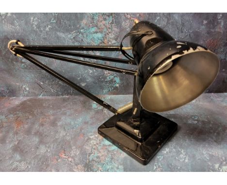 A Herbert Terry Anglepoise lamp - an early example finished in black, weighted plinth base. A/F 