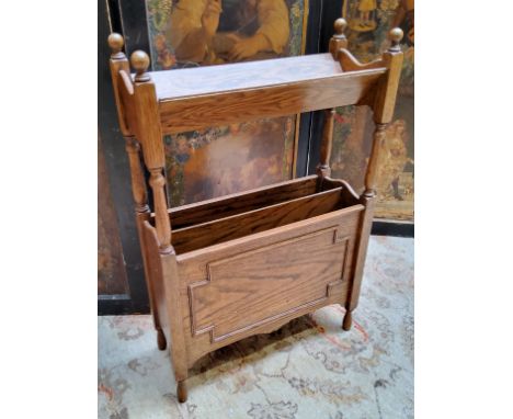 An early 20th century oak Arts &amp; Crafts type magazine rack and book trough c.1920 