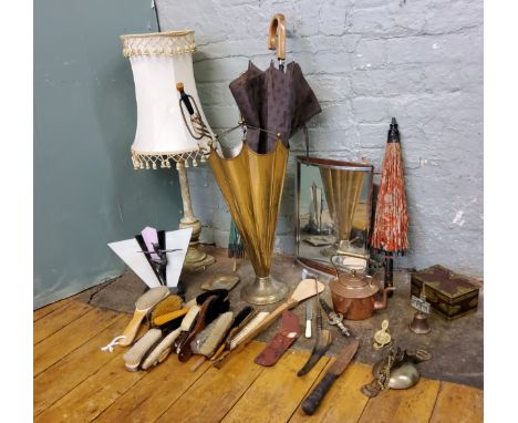 An early 20th century gilt metal stick stand, in the form of an umbrella, 75cm high;&nbsp; &nbsp;a mirrored two handled recta