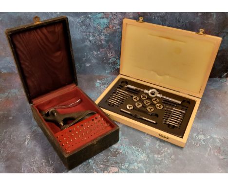 Watchmaker's Tools - a Pierre Seitz jeweling tool,boxed; an L.A.L Ltd tap &amp; die set,boxed (2) 