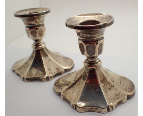 Pair of hallmarked silver Art Deco stub candlesticks assay Birmingham weighted A/F CONDITION REPORT: One with part weighting 