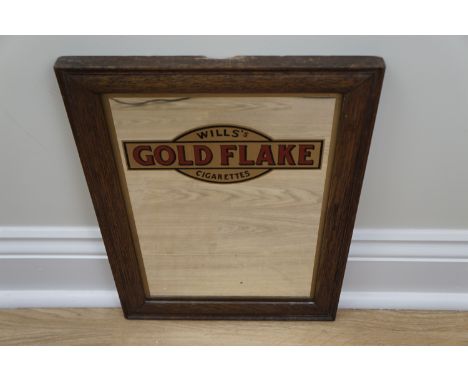 A Wills' Gold Flake advertising mirror in oak frame, 31 cm x 41 cm