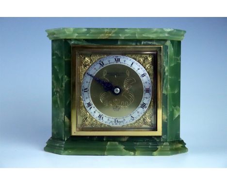 An Elliott onyx mantle clock, 17 cm x 14 cm high, (running when catalogued, accuracy and reliability un-tested)