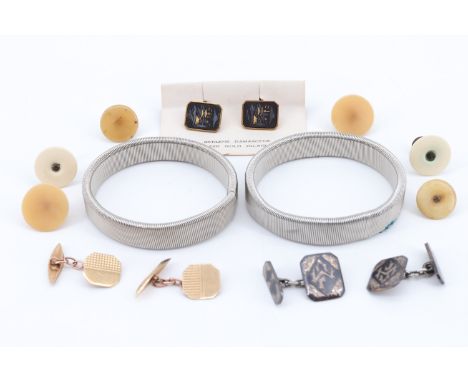 A pair of 9ct gold cuff links, together with a silver niello pair, a "Genuine Damascene 24 K Gold Inlaid" pair, two arm bands
