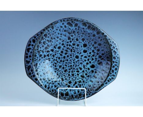 A Poole Pottery mottled blue / black glazed fruit bowl, 35 cm