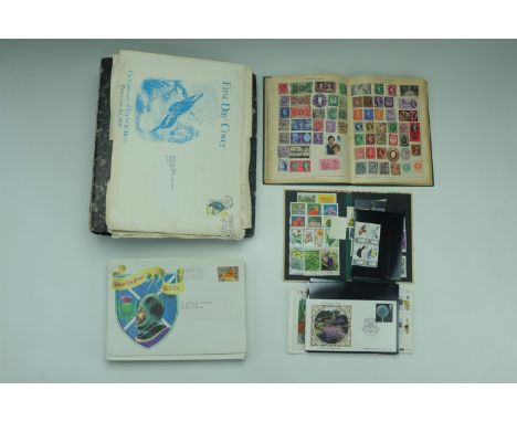 A binder of largely 20th Century world stamps together with a mid-20th Century juvenile stamp album, first day covers etc