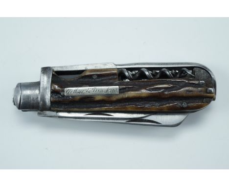 An early 20th Century pocket folding tool knife by Turner of Sheffield, having antler grip scales and incorporating two knife