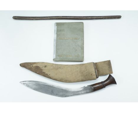 A Second World War kukri, the scabbard having a theatre-made webbing cover and belt loop, 48 cm, (kukri devoid of markings), 