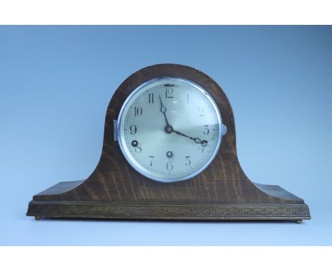 A 1950s oak "Napoleon hat" mantle clock, 43 cm x 25 cm