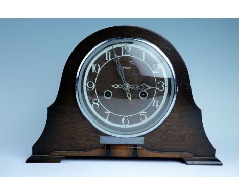A 1940s Enfield mantle clock, face 16 cm