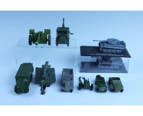 Six Dinky Toys military vehicles, comprising a Scout Car No. 673, an Armoured Command Vehicle No. 667, an Open Topped Wagon, 