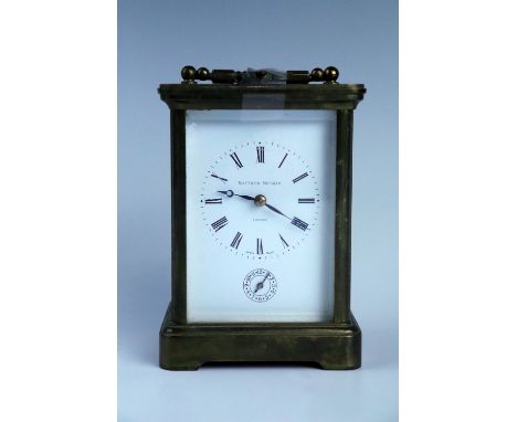 A late 20th Century Matthew Norman carriage alarm clock, 14 cm excluding handle, (running when catalogued, accuracy and relia