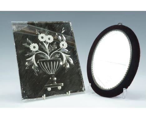 A small Victorian facet-cut oval wall mirror, having a deep Burgundy plush velvet frame, 24 cm x 17 cm, together with a Victo
