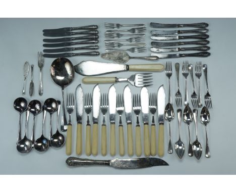 A silver dessert fork and two silver butter knives, together with two sets of six silver handled tea knives and several sets 