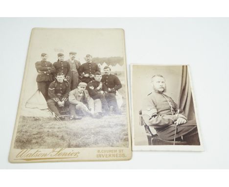 A Victorian carte de visite portrait of an army warrant officer together with a cabinet card study annotated "1st Volunteer B