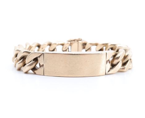 A 1970s gentleman's 9 ct gold chain bracelet, having a vacant central panel in a Cuban link chain with a sliding clasp, Londo