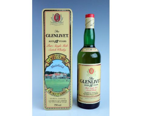 A bottle of Glenlivet pure single malt scotch whisky, in Classic golf courses Muirfield tinplate box, 