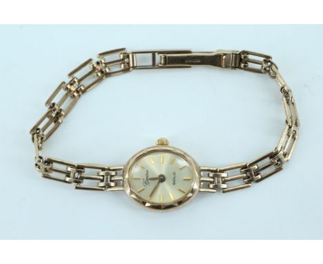 A late 20th Century 9 ct gold Genève wristwatch, having a quartz movement and a gate link 9 ct gold bracelet, 8.37 g, (not ru
