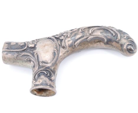 A late 19th / early 20th Century German 800 standard white metal Rococo style walking stick handle, 9.5 cm long, 41 g