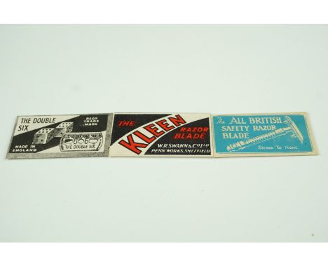 Three Second World War British military issue razor blade compasses, broad arrow marked.  [Designed by MI-9, magnetized to se