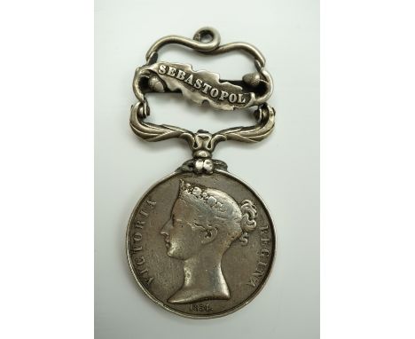 A Crimea Medal with Sebastopol clasp engraved to Pte R Brown, 12th Lancers