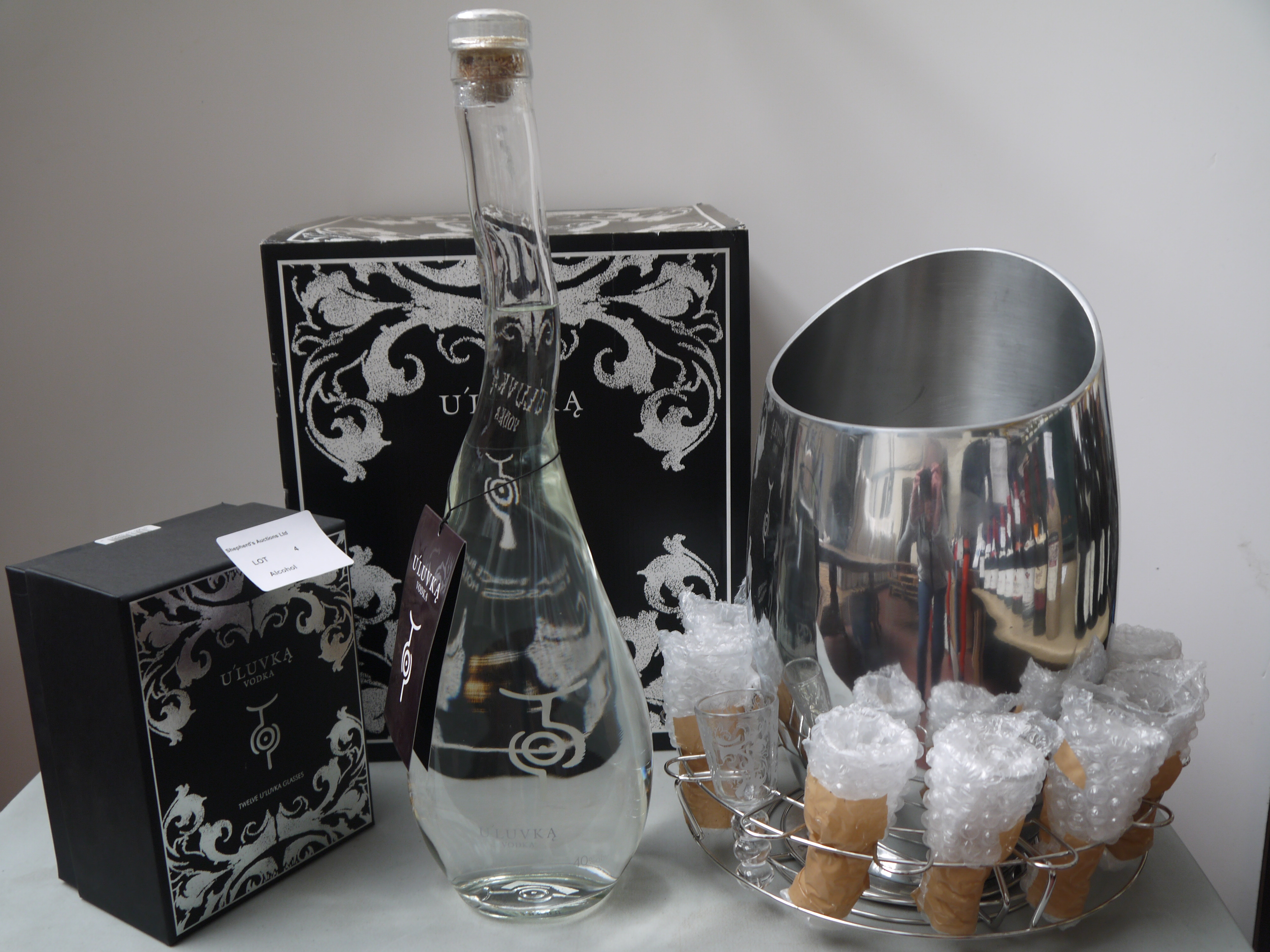 1x 175cl U'Luvka Vodka Magnum. With box, Ice Bucket and Glass Holder as well as the shot glasses