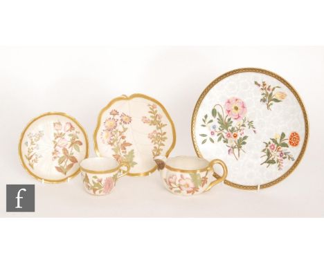 A late 19th Century Royal Worcester blush ivory trio in the Aesthetic taste decorated with flowers and foliage, each with mou