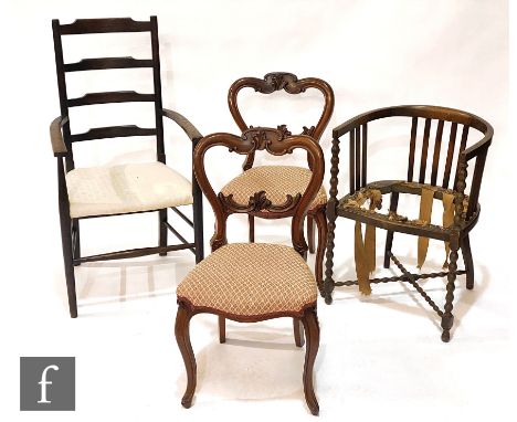 A pair of Victorian rosewood balloon back salon chairs on cabriole legs, a bobbin turned oak easy chair, lacking seat and a a