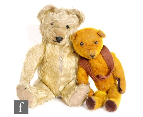 Patrick, an early 20th Century teddy bear, probably Gebruder Bing, circa 1905-1910, golden mohair, black boot button eyes (on