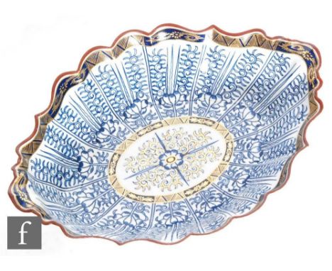 A large late 18th Century Worcester shaped bowl decorated in the underglaze blue Royal Lily pattern with gilt detailing, inci