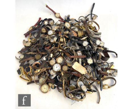 A parcel lot of early 20th Century and later lady's wrist watches to include gold plated, manual and quartz examples, sold as